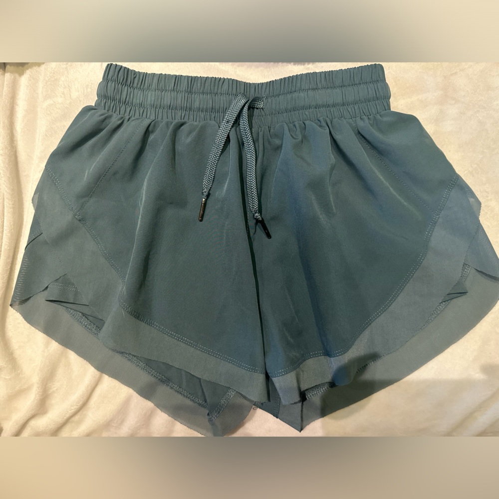2 pair active shorts; 1 green, 1 black